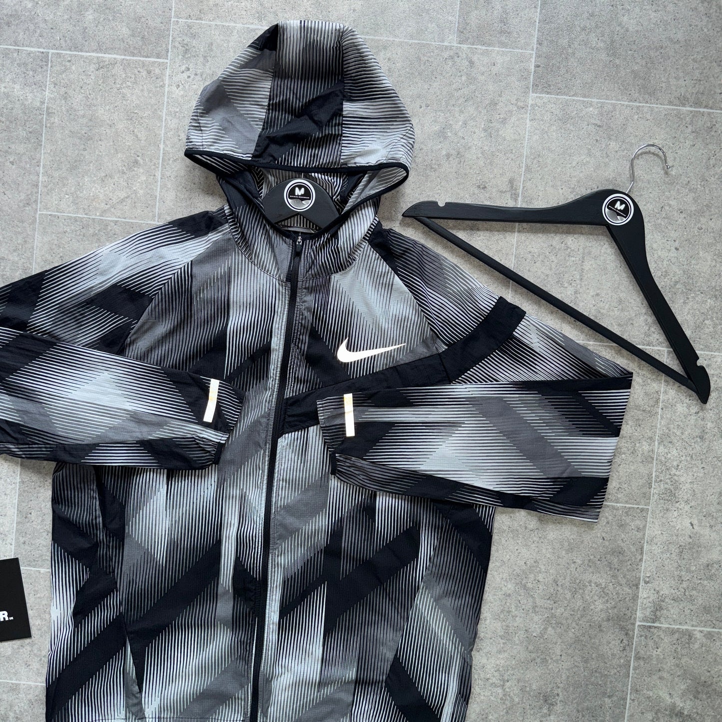 NIKE ‘IMPOSSIBLY LIGHT’ JACKET