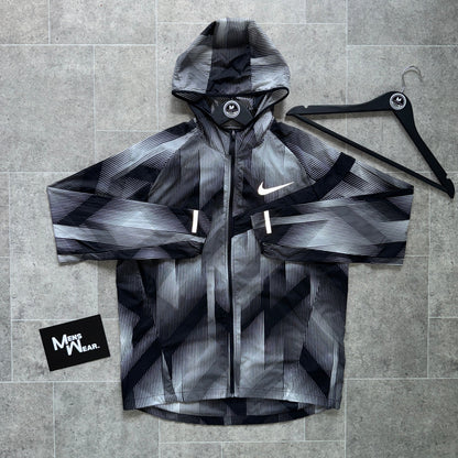 NIKE ‘IMPOSSIBLY LIGHT’ JACKET